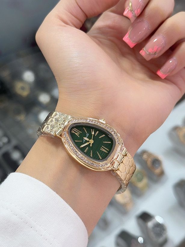 ساعت مچی زنانه Aoqili نگیندار مدل Serpenti، 5757229àبند فلزی طرح لانهزنبوری، صفحه بیضی - نمای بند
